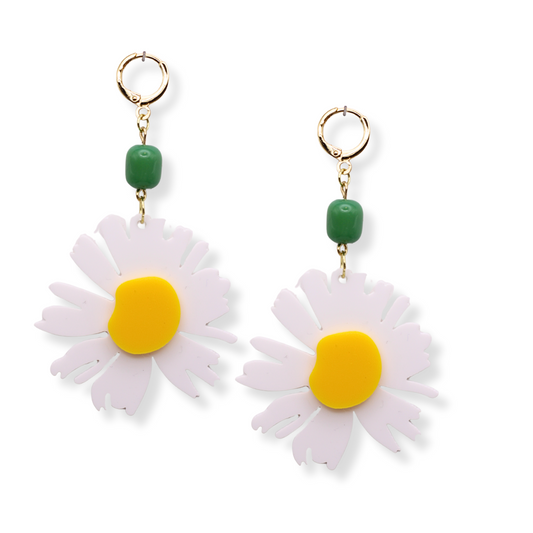 The oversized Daisy earrings are lightweight and add a mod pop to your spring outfits. They are made with dainty acrylic and glass beads. 