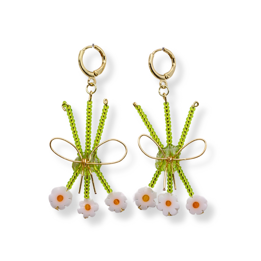 The Louise earrings are a dainty spring staple. They are hand beaded and feature glass beads and hypoallergenic hardware
