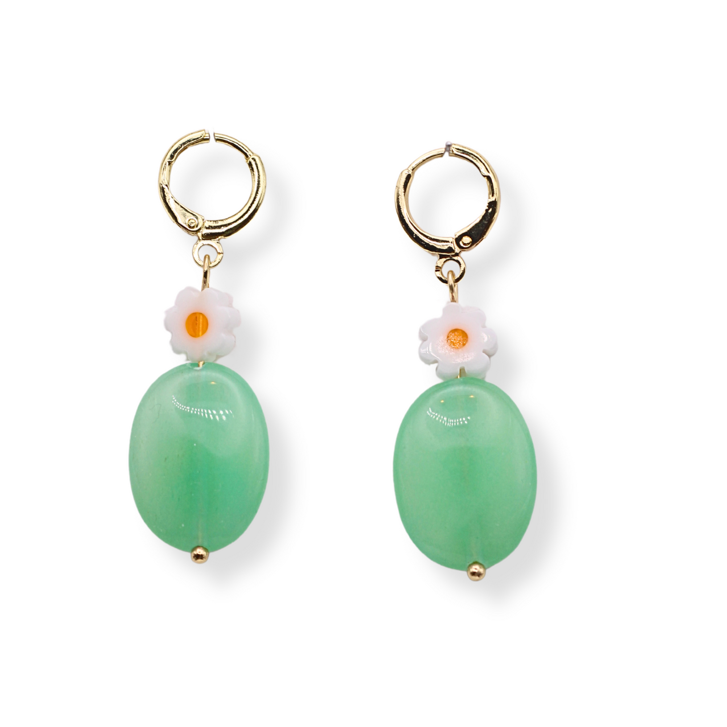 Get ready for spring with our Lola Flower Earrings. These dangle earrings feature a glass daisy bead, a solid jade stone bead, and hypoallergenic gold plated huggie hoops.