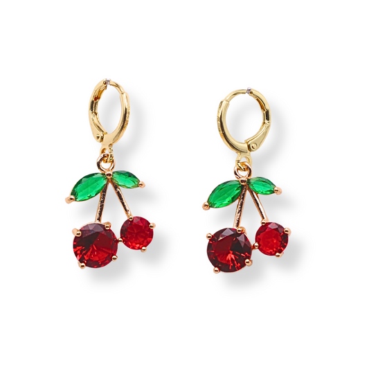 These sweet cherry Huggie hoops are a summertime dream! Made with plated gold stainless steel and colorful crystals, they are perfect for jazzing up your sundresses this season. 