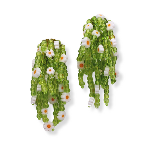 The Willow Earrings are inspired by the weeping willows in Monet’s most beloved paintings. They embody the freshness of spring and new growth. These earrings are hand beaded in a process that takes multiple hours from start to finish. 